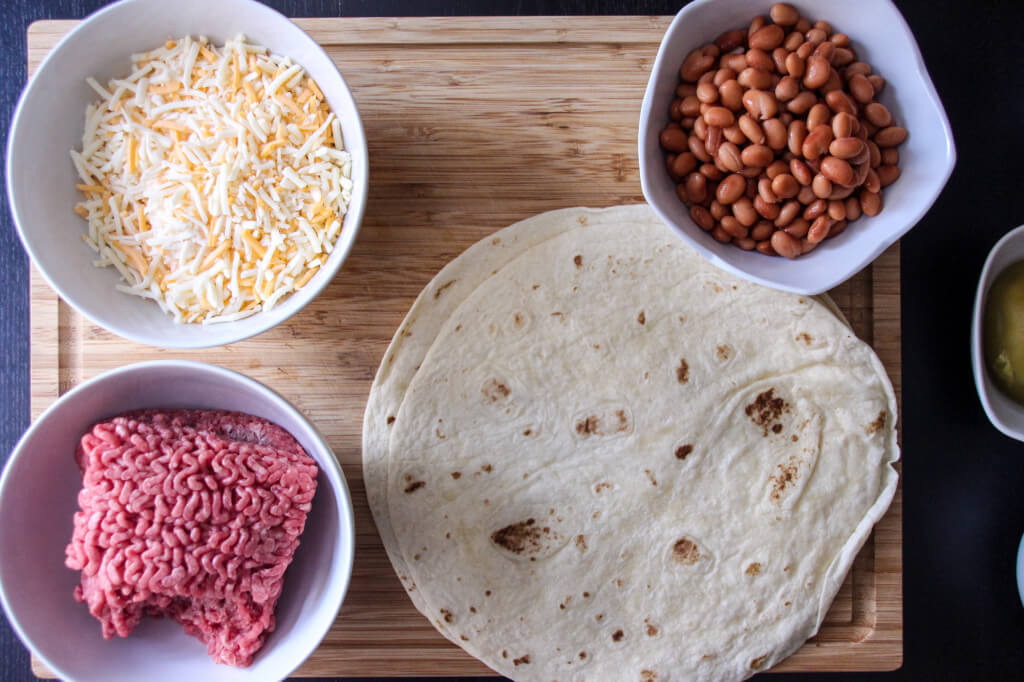 Smothered Burritos with Red Sauce and Queso Recipe